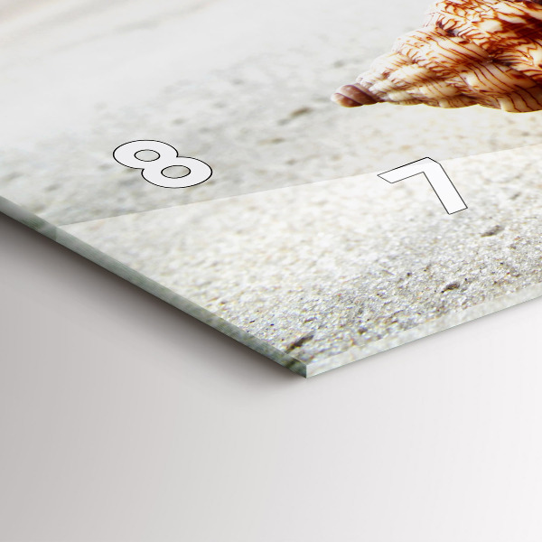 Horizontal wall clock A shell on the beach