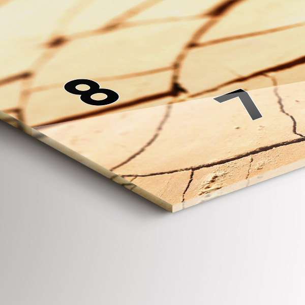 Horizontal wall clock A plant in dried-out soil