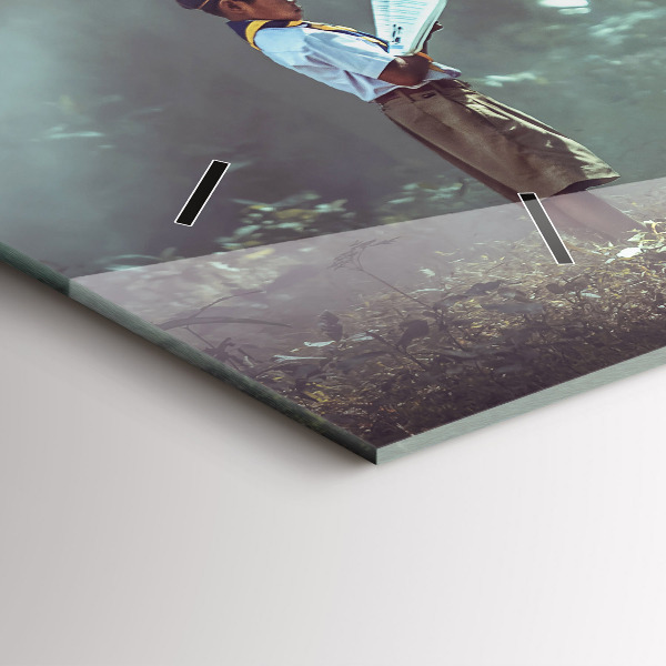 Horizontal wall clock A boy is reading a book