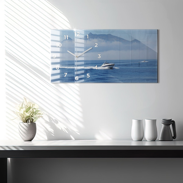 Horizontal wall clock A boat floating on the ocean