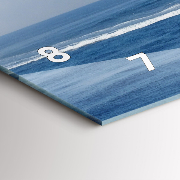 Horizontal wall clock A boat floating on the ocean