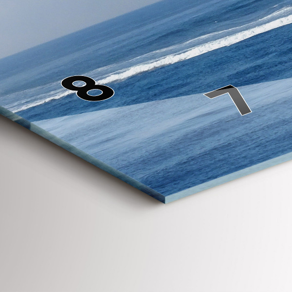 Horizontal wall clock A boat floating on the ocean