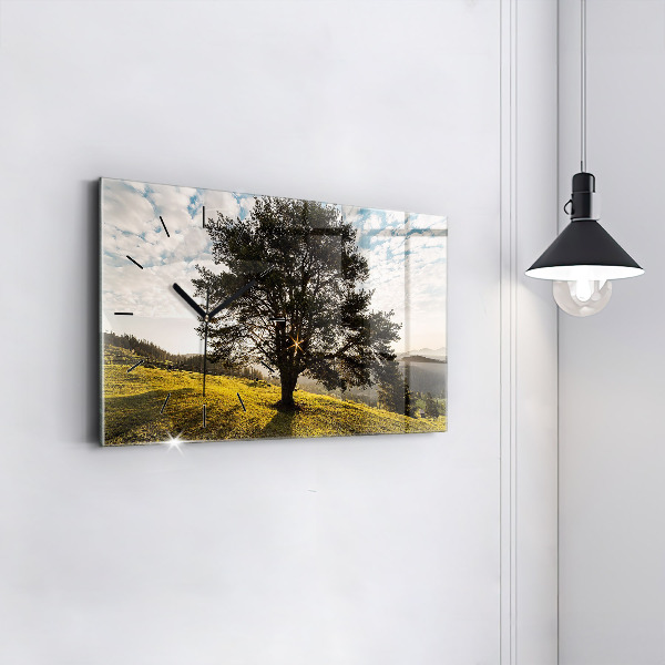Horizontal wall clock A tree on a hill