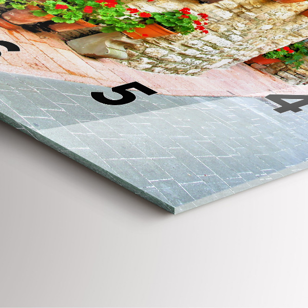 Square wall clock A picturesque street