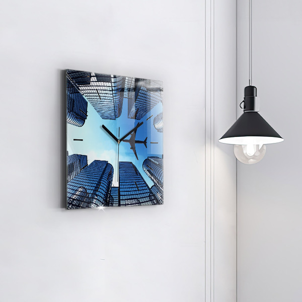 Square wall clock Airplane over buildings
