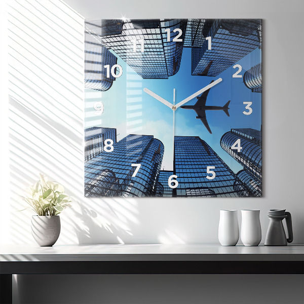 Square wall clock Airplane over buildings