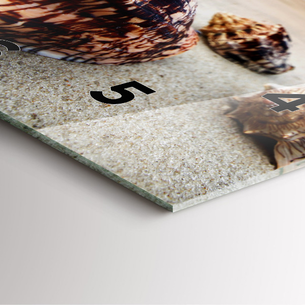 Square wall clock A shell on the beach