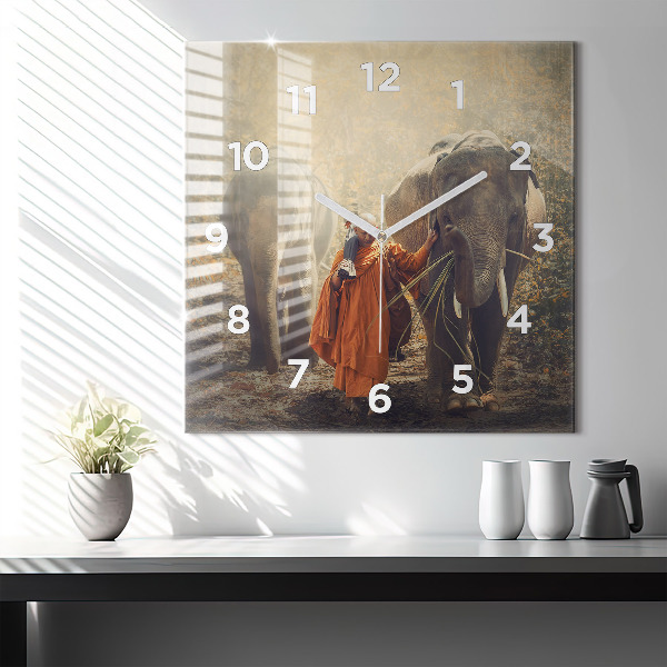 Square wall clock Monk leading elephants