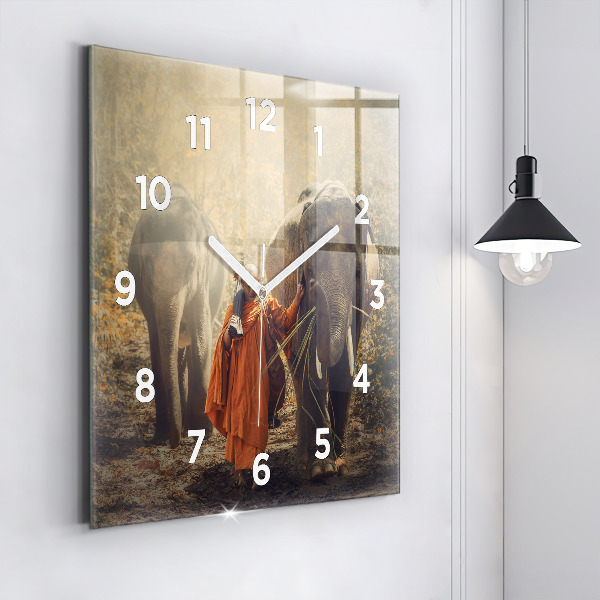 Square wall clock Monk leading elephants
