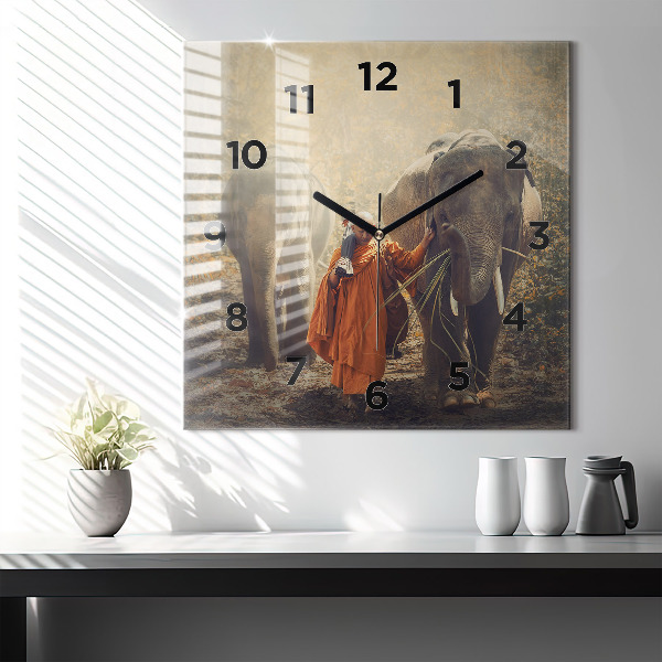 Square wall clock Monk leading elephants