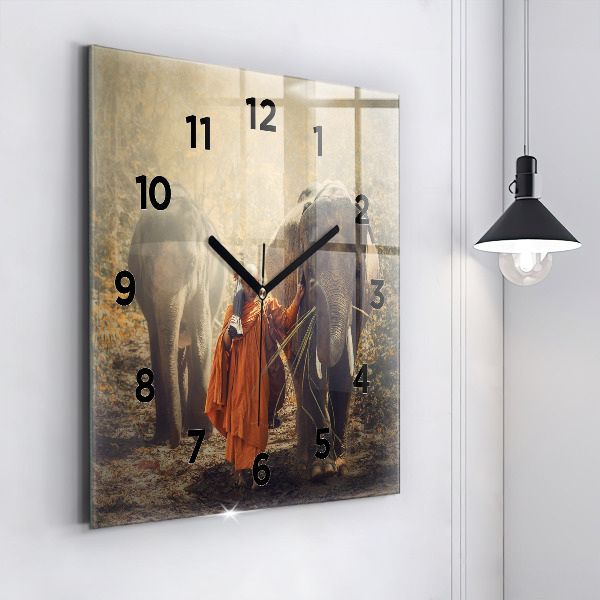 Square wall clock Monk leading elephants