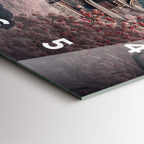 Square wall clock Tower and flowers in Asia