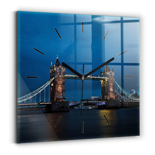 Square wall clock Tower Bridge London at night