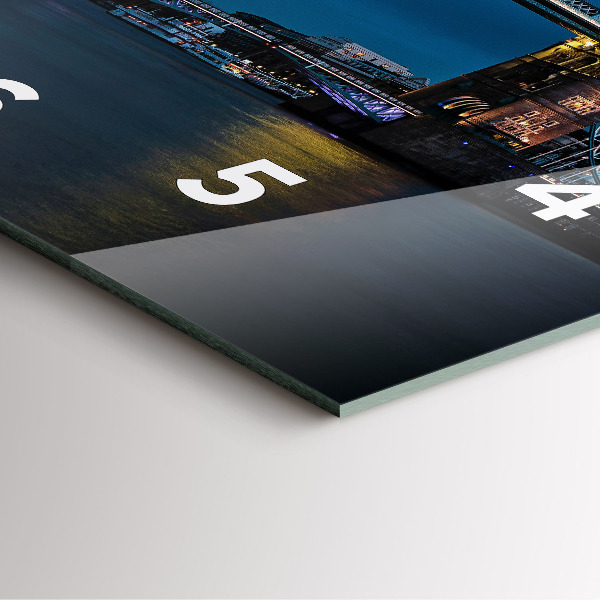 Square wall clock Tower Bridge London at night