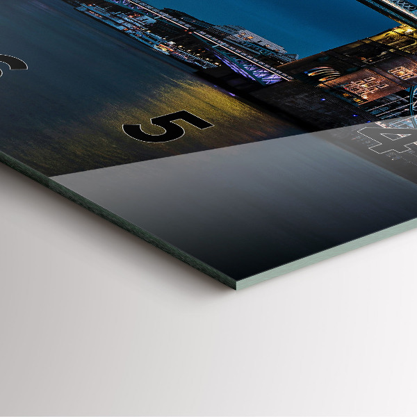 Square wall clock Tower Bridge London at night