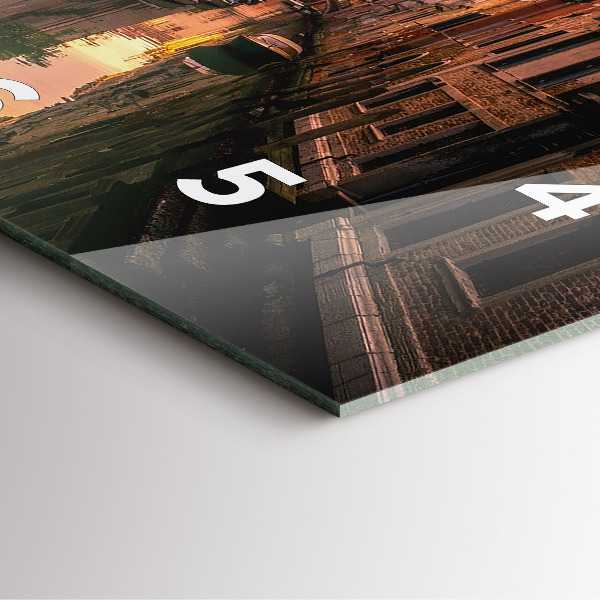 Square wall clock View of the canal in the city