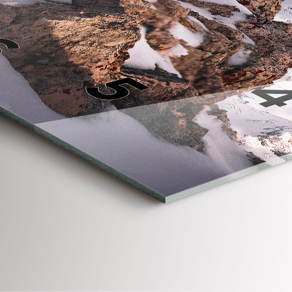 Square wall clock A mountain covered in snow