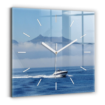 Square wall clock A boat floating on the ocean
