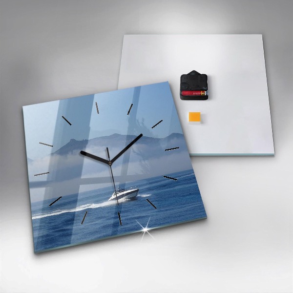 Square wall clock A boat floating on the ocean