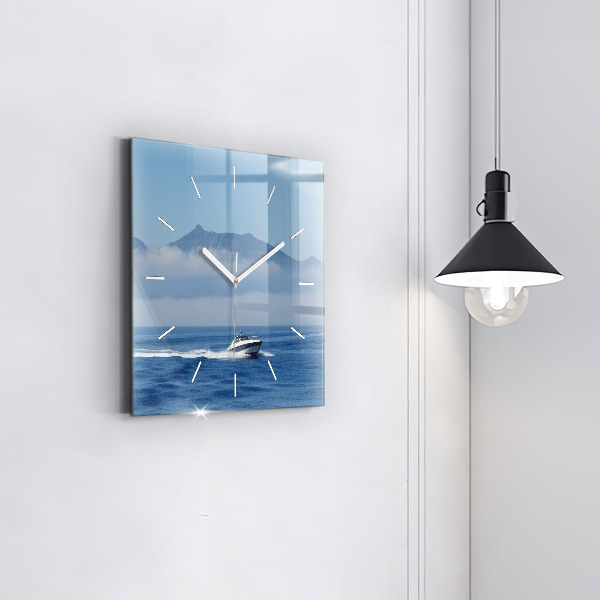 Square wall clock A boat floating on the ocean