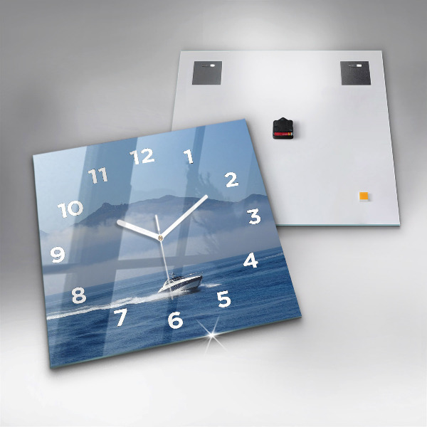 Square wall clock A boat floating on the ocean