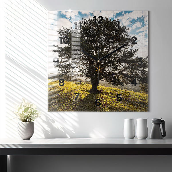 Square wall clock A tree on a hill
