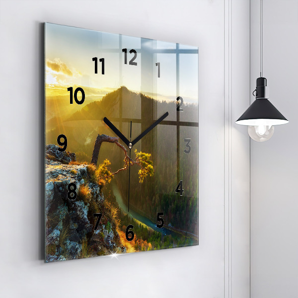 Square wall clock Sunset over the mountains
