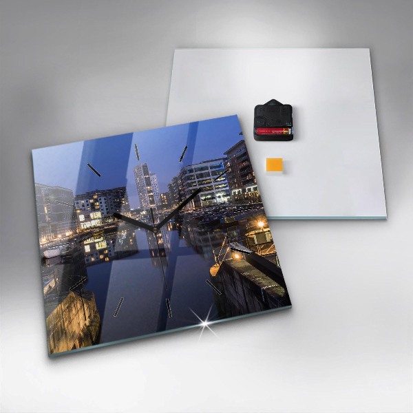 Square wall clock The city lit up at night