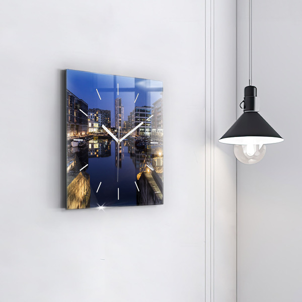 Square wall clock The city lit up at night