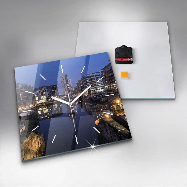 Square wall clock The city lit up at night