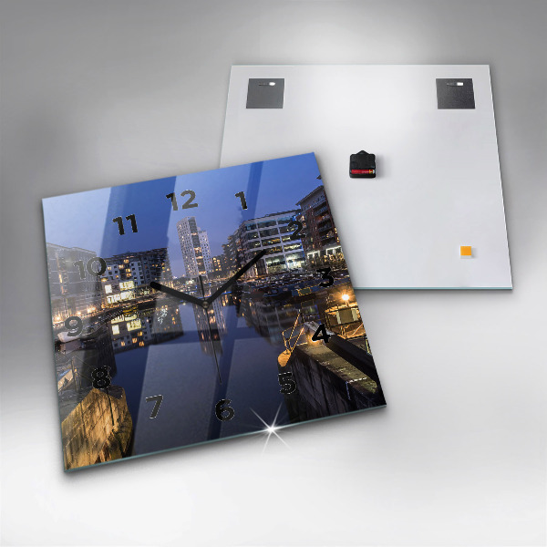 Square wall clock The city lit up at night