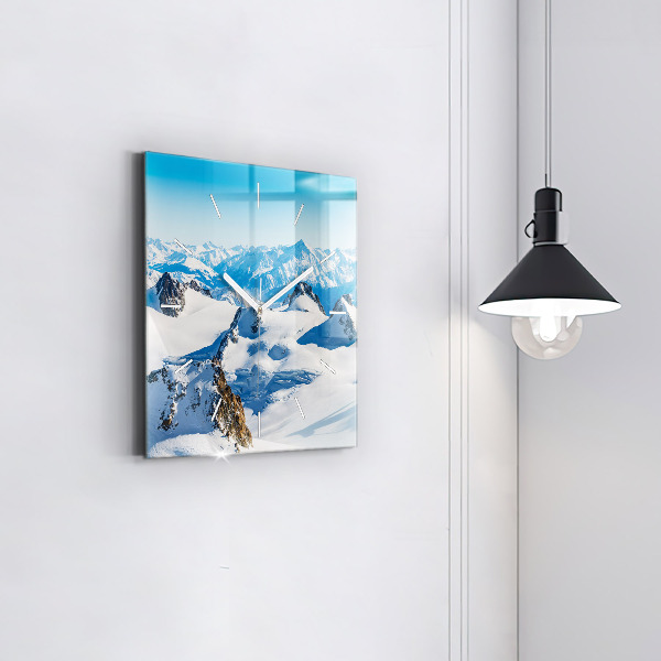 Square wall clock Skier in the Alps