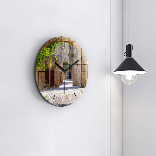 Round glass wall clock Picturesque street of Rhodes