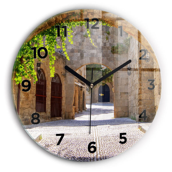 Round glass wall clock Picturesque street of Rhodes