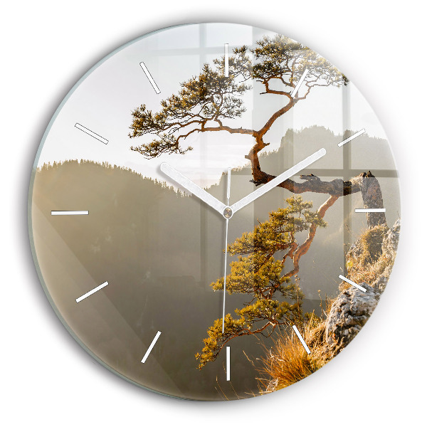 Round glass wall clock A tree in the mountains