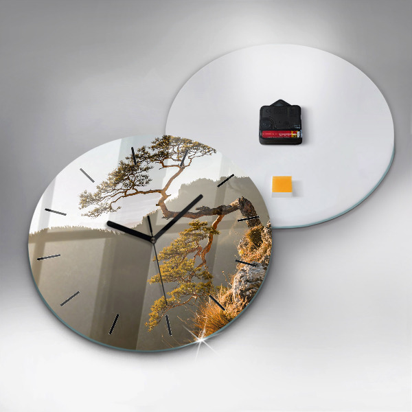 Round glass wall clock A tree in the mountains