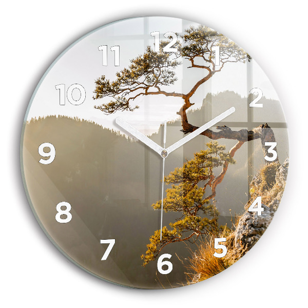 Round glass wall clock A tree in the mountains