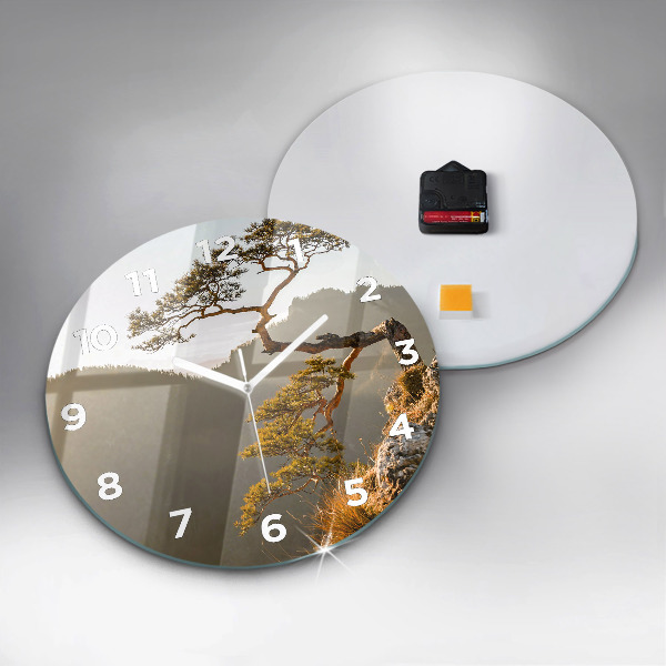 Round glass wall clock A tree in the mountains
