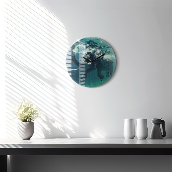 Round glass wall clock Swimming elephant in the ocean