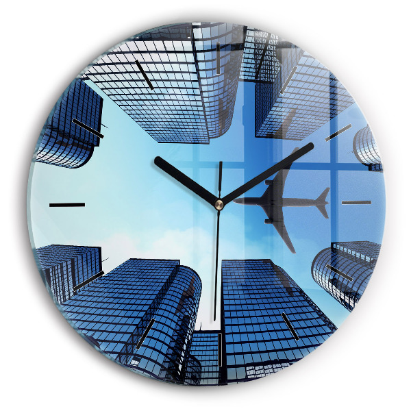 Round glass wall clock Airplane over buildings