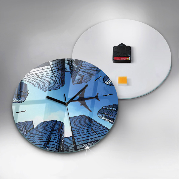Round glass wall clock Airplane over buildings