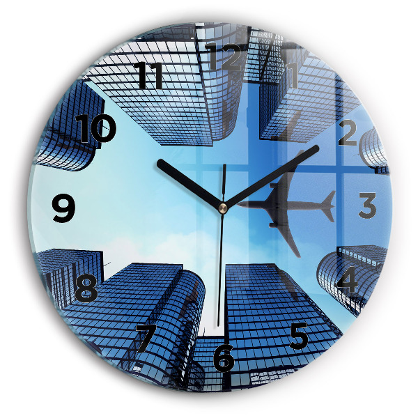 Round glass wall clock Airplane over buildings
