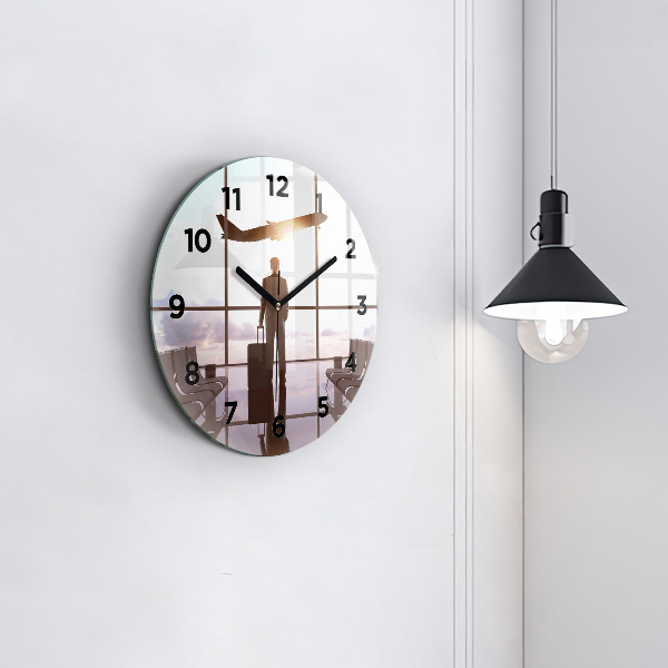 Round glass wall clock Man at the airport