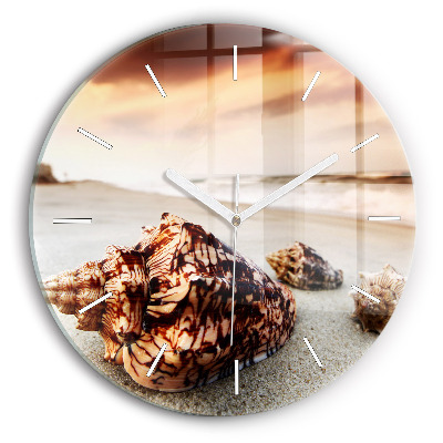 Round glass wall clock A shell on the beach