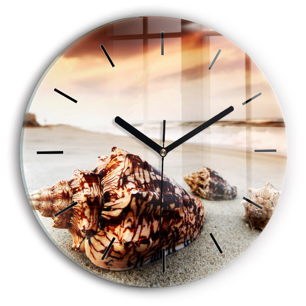 Round glass wall clock A shell on the beach