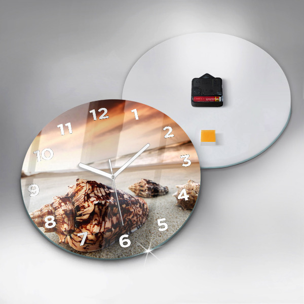 Round glass wall clock A shell on the beach
