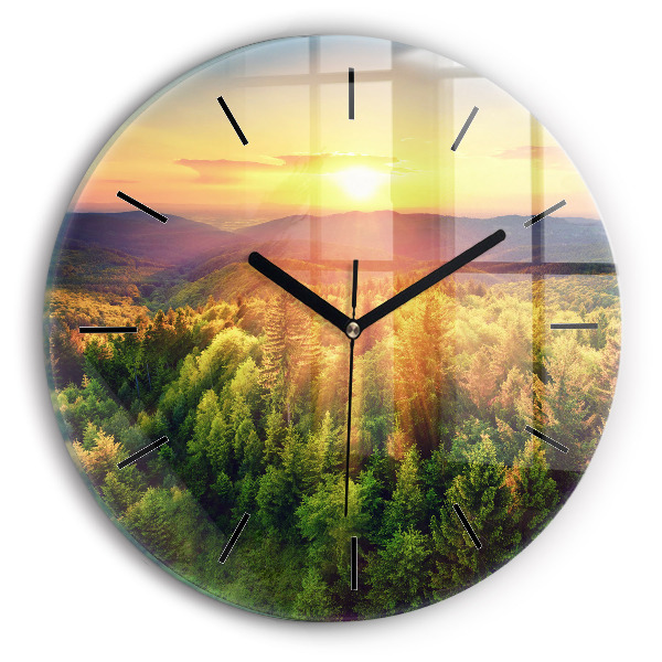 Round glass wall clock Sunset over the hills