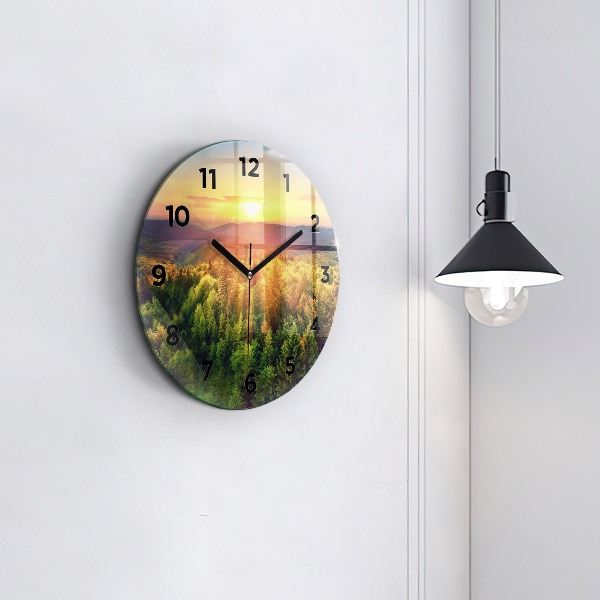 Round glass wall clock Sunset over the hills
