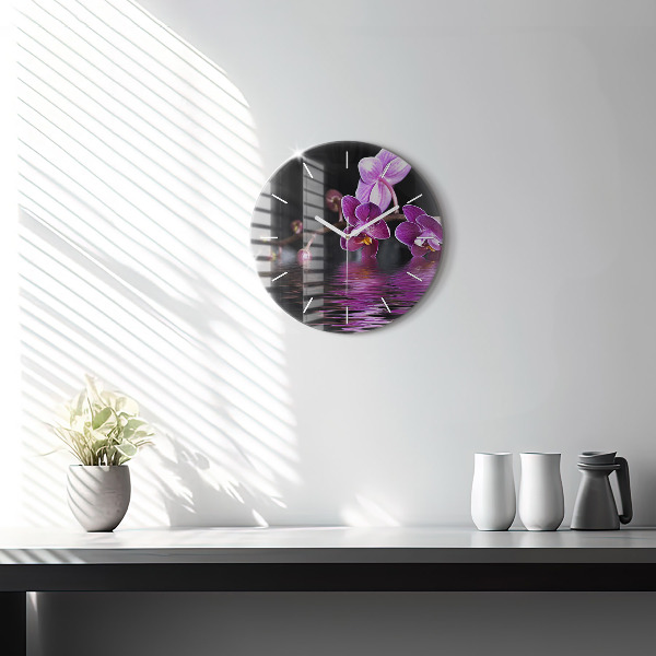 Round glass wall clock Orchid flower on the water