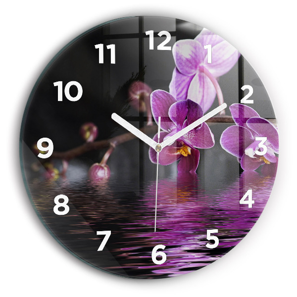 Round glass wall clock Orchid flower on the water